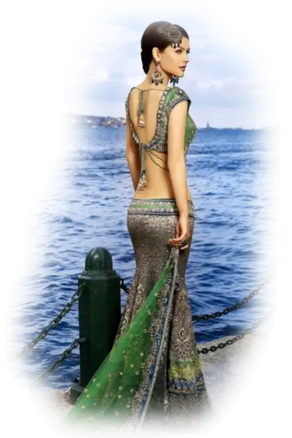 Elegant Woman in Traditional Dress by the Ocean