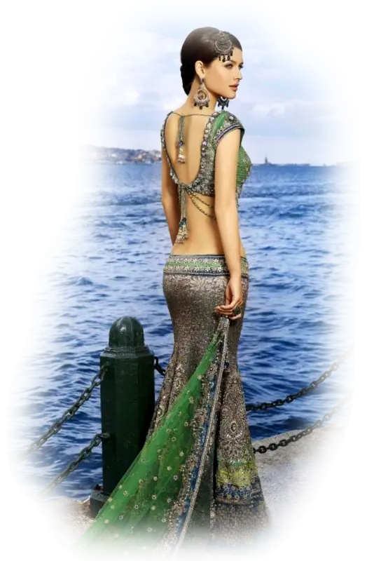 Elegant Woman in Traditional Dress by the Ocean