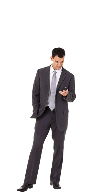 Businessman in a Suit Checking Phone