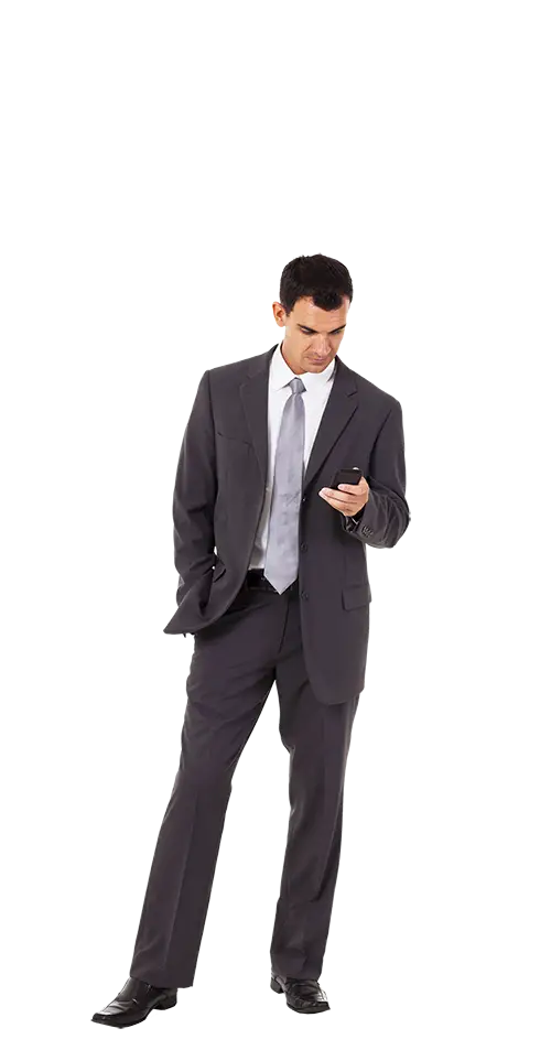 Businessman in a Suit Checking Phone
