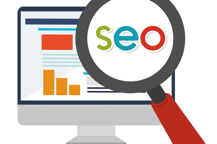SEO Concept with Magnifying Glass and Computer