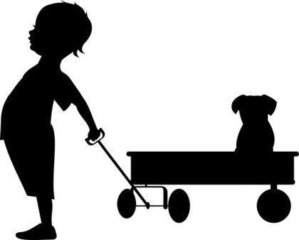 Silhouette of Boy Pulling Wagon with Dog
