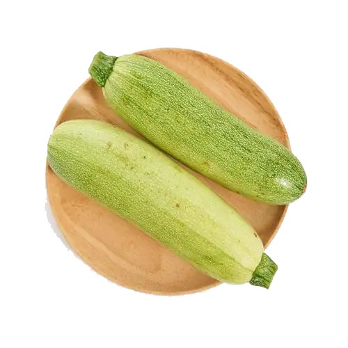 Fresh Green Zucchini on Wooden Plate