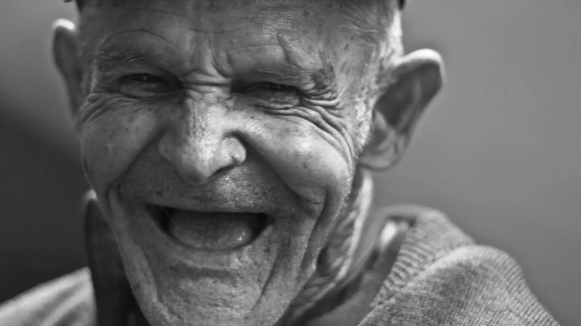 Laughing Elderly Man in Black and White