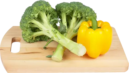 Broccoli and Yellow Bell Pepper on Cutting Board