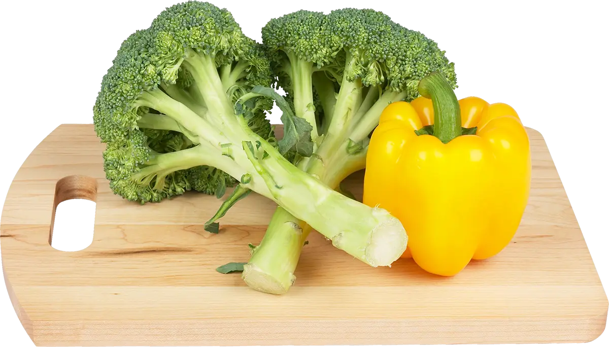 Broccoli and Yellow Bell Pepper on Cutting Board