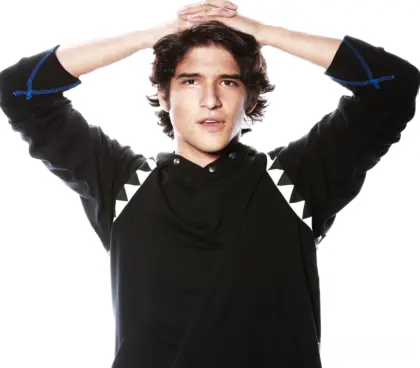 Person in Black Hoodie with Hands Up