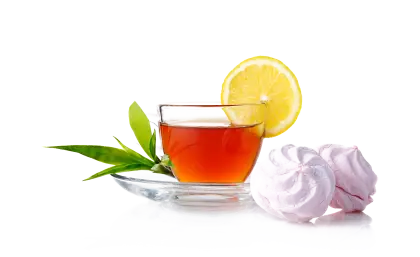 Refreshing Tea with Lemon and Green Leaves