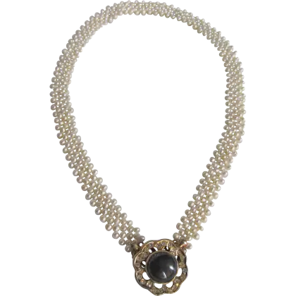 Elegant Pearl Necklace with Jewel Centerpiece