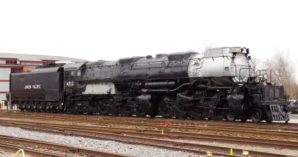 Vintage Steam Locomotive on Tracks