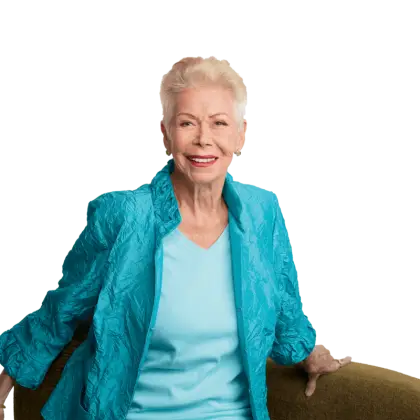 Smiling Elderly Woman in Blue Jacket