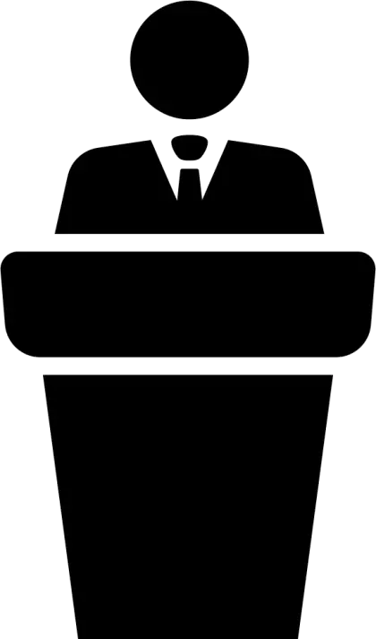 Speaker at Podium Giving a Lecture