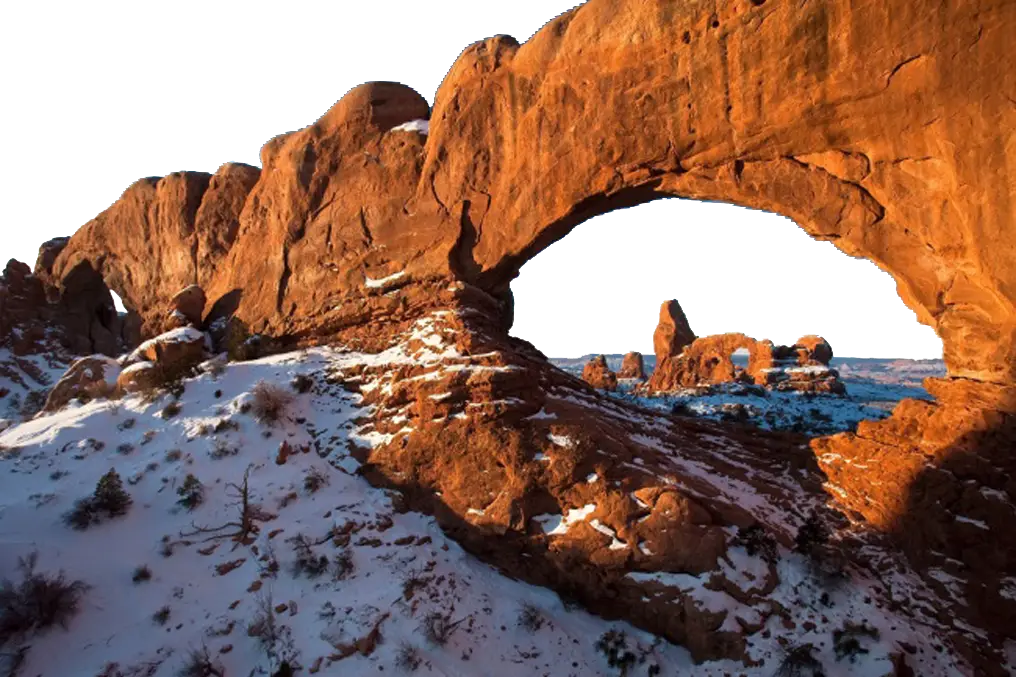Natural Rock Arch in a Snowy Desert