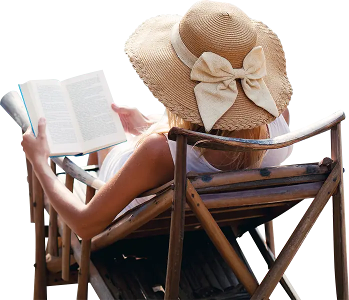 Woman Reading in Chair with Hat