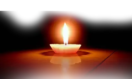 Glowing Candle in the Dark
