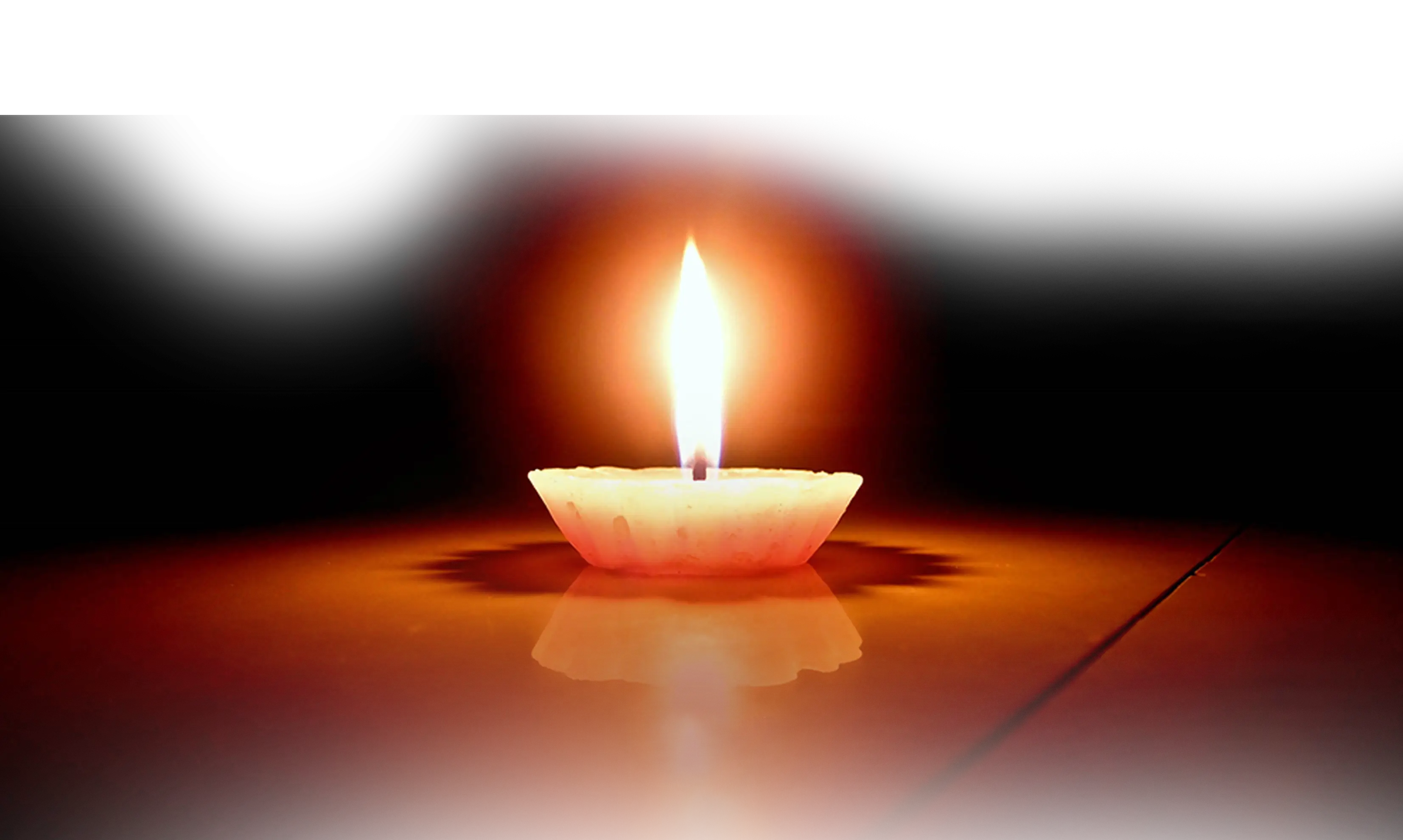 Glowing Candle in the Dark