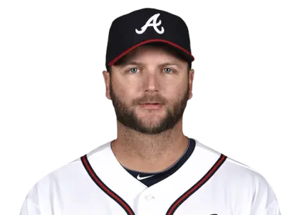 Person Wearing Baseball Cap and Uniform
