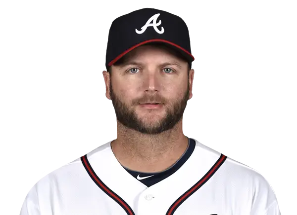 Person Wearing Baseball Cap and Uniform