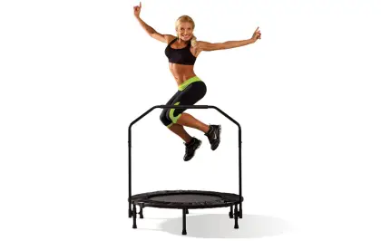 Woman Jumping on Trampoline