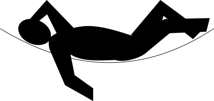 Silhouette of a Person Relaxing in a Hammock