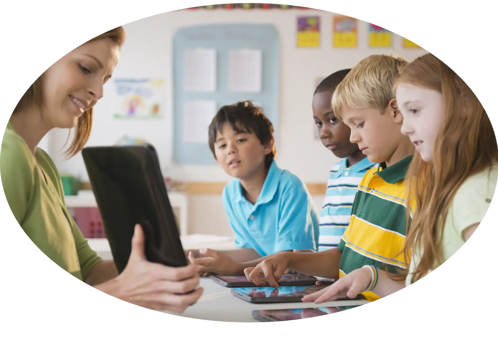 Teacher Using Tablet with Students in Classroom