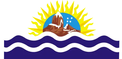 Sun Rising Over Mountains and Waves