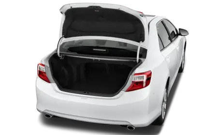 Open Car Trunk of a White Sedan