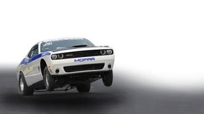 White Car in High-Speed Drag Race