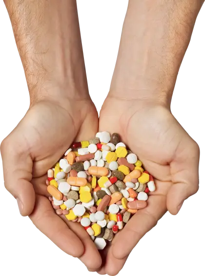 Hands Holding a Variety of Colorful Pills