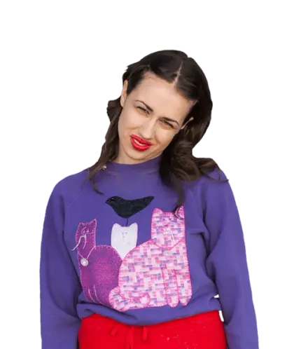 Woman in Purple Sweater and Red Pants
