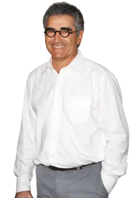 Smiling Man in White Shirt with Glasses