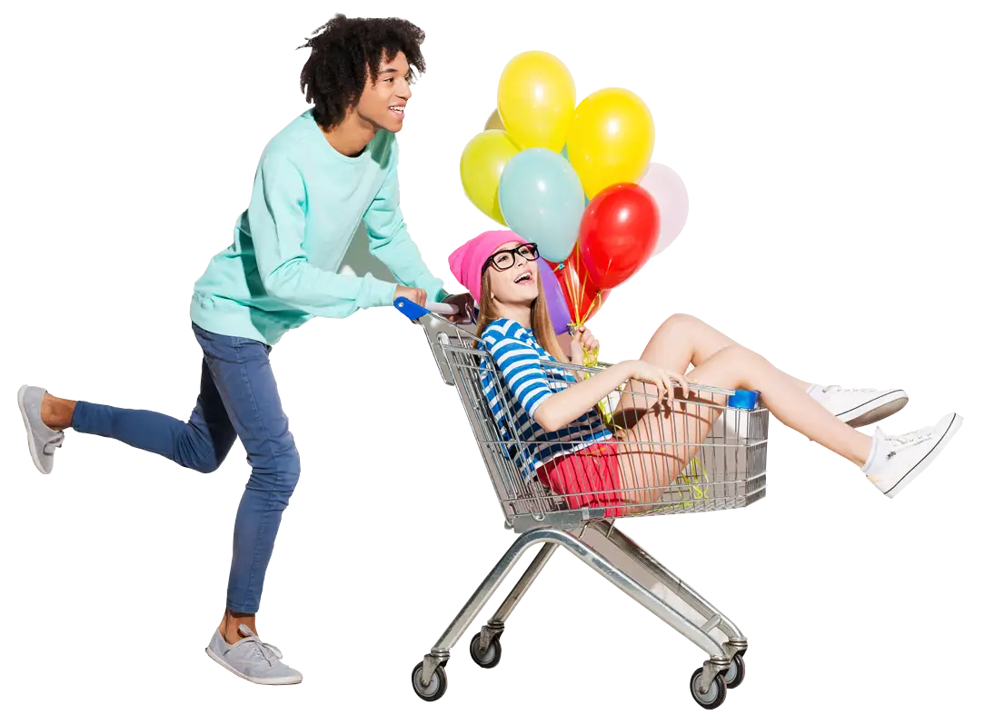 Friends Having Fun with Shopping Cart and Balloons