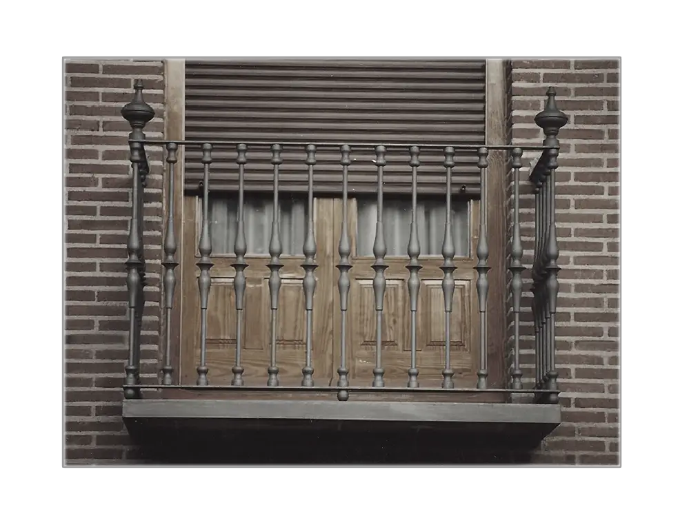 Iron Balcony with Wooden Shutters