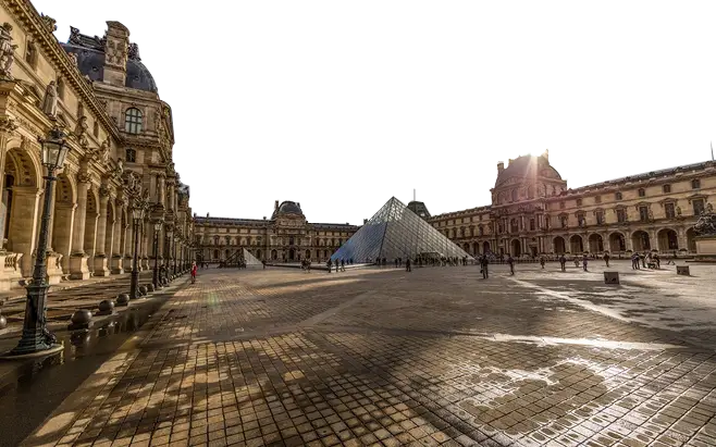 Louvre Pyramid in Paris Courtyard