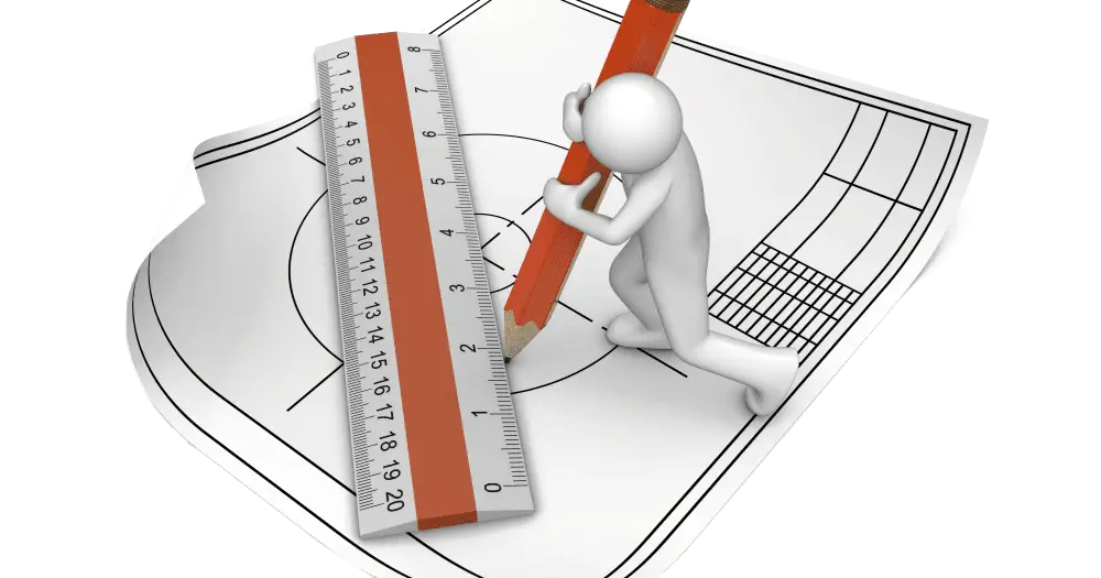 Person Drawing on Blueprint