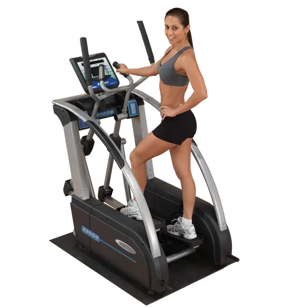 Woman Exercising on Elliptical Machine
