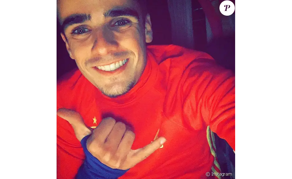 Smiling Person in Red Shirt