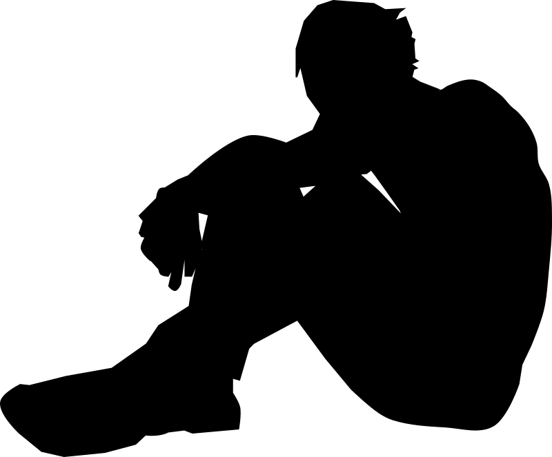 Silhouette of a Person Sitting