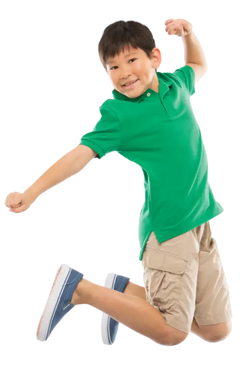 Jumping Happy Child in Green Shirt Full of Joy