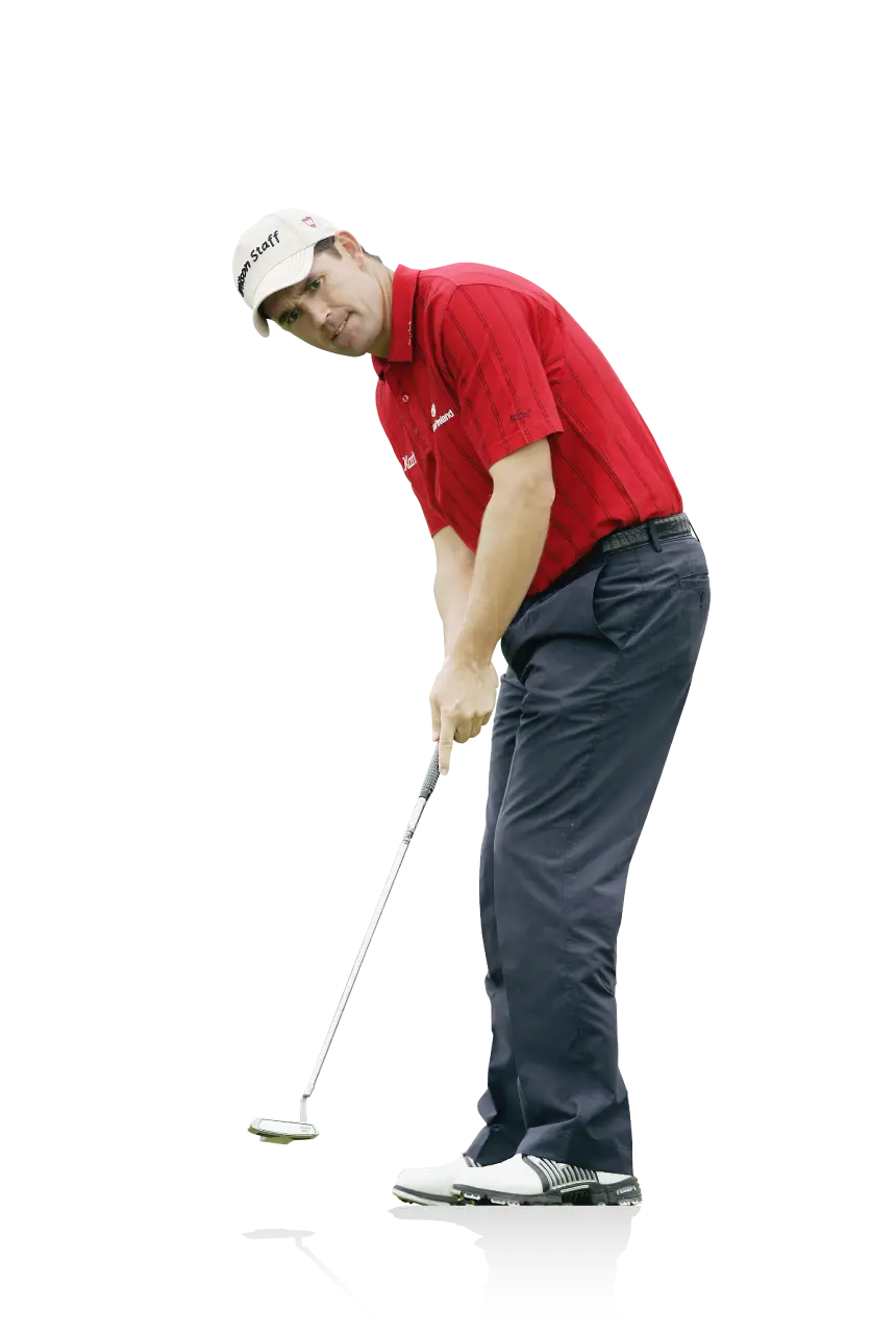 Golfer in Red Shirt Holding Putter