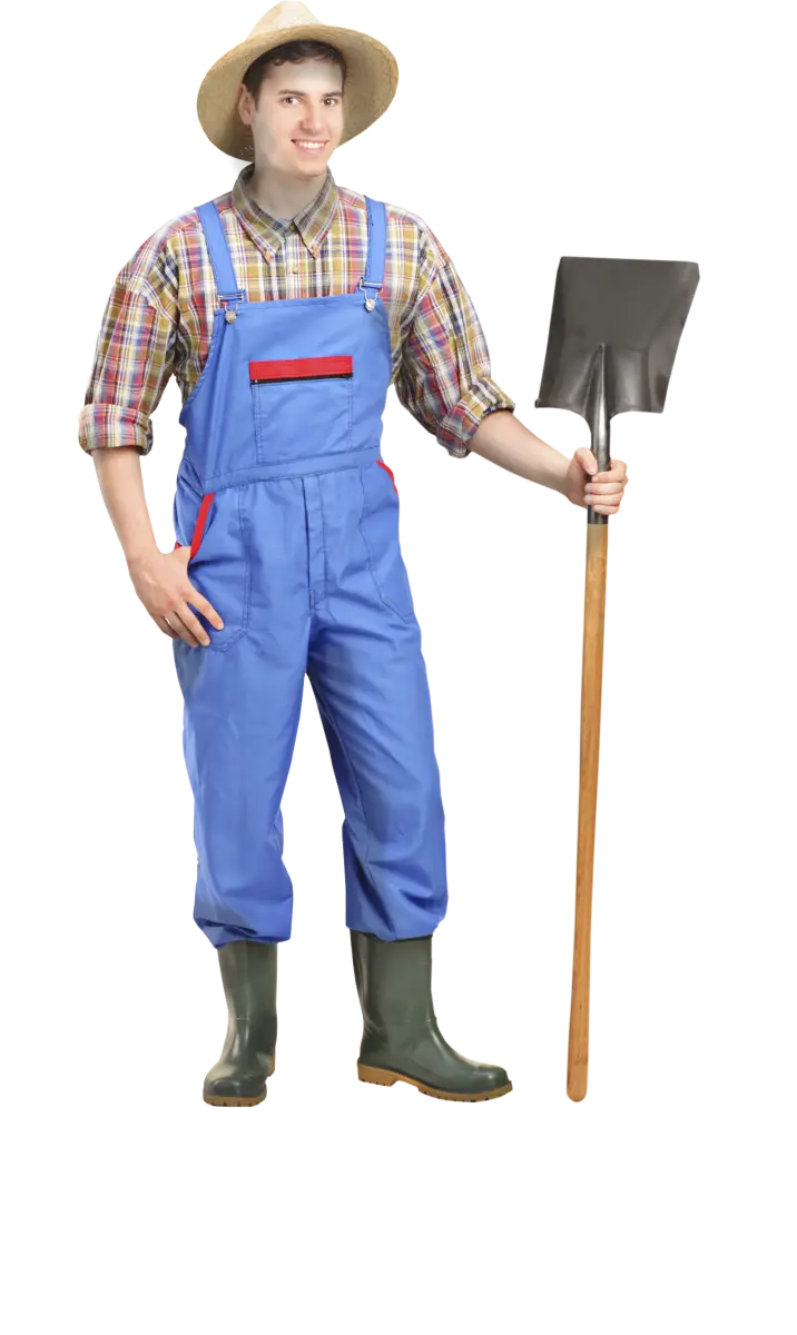 Farmer with Shovel in Blue Overalls