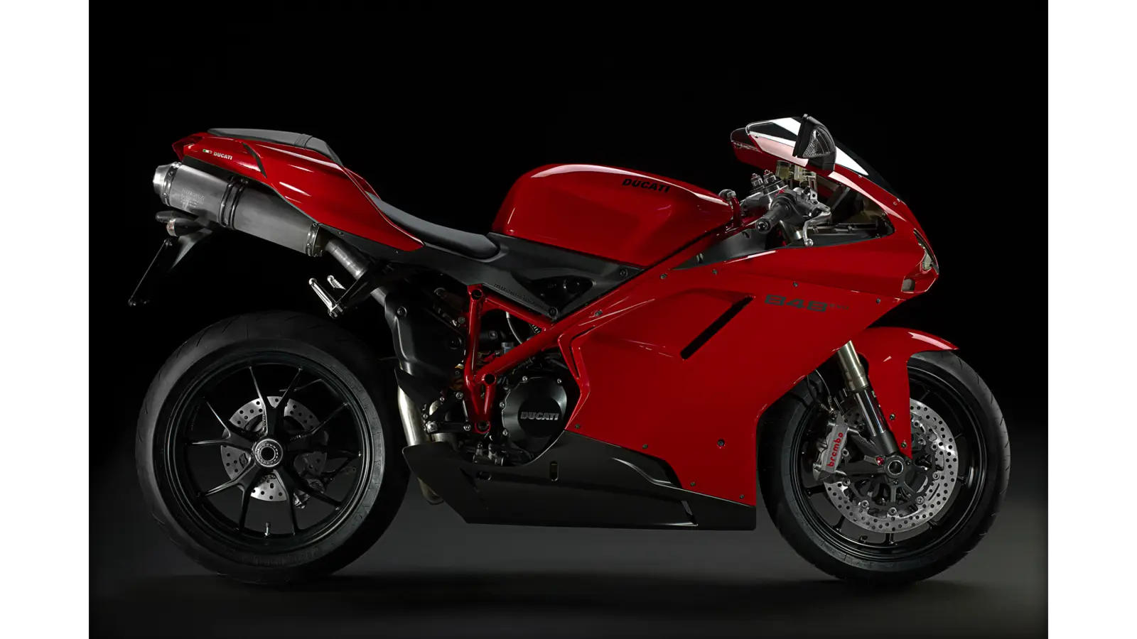Red Sports Motorcycle on Black Background
