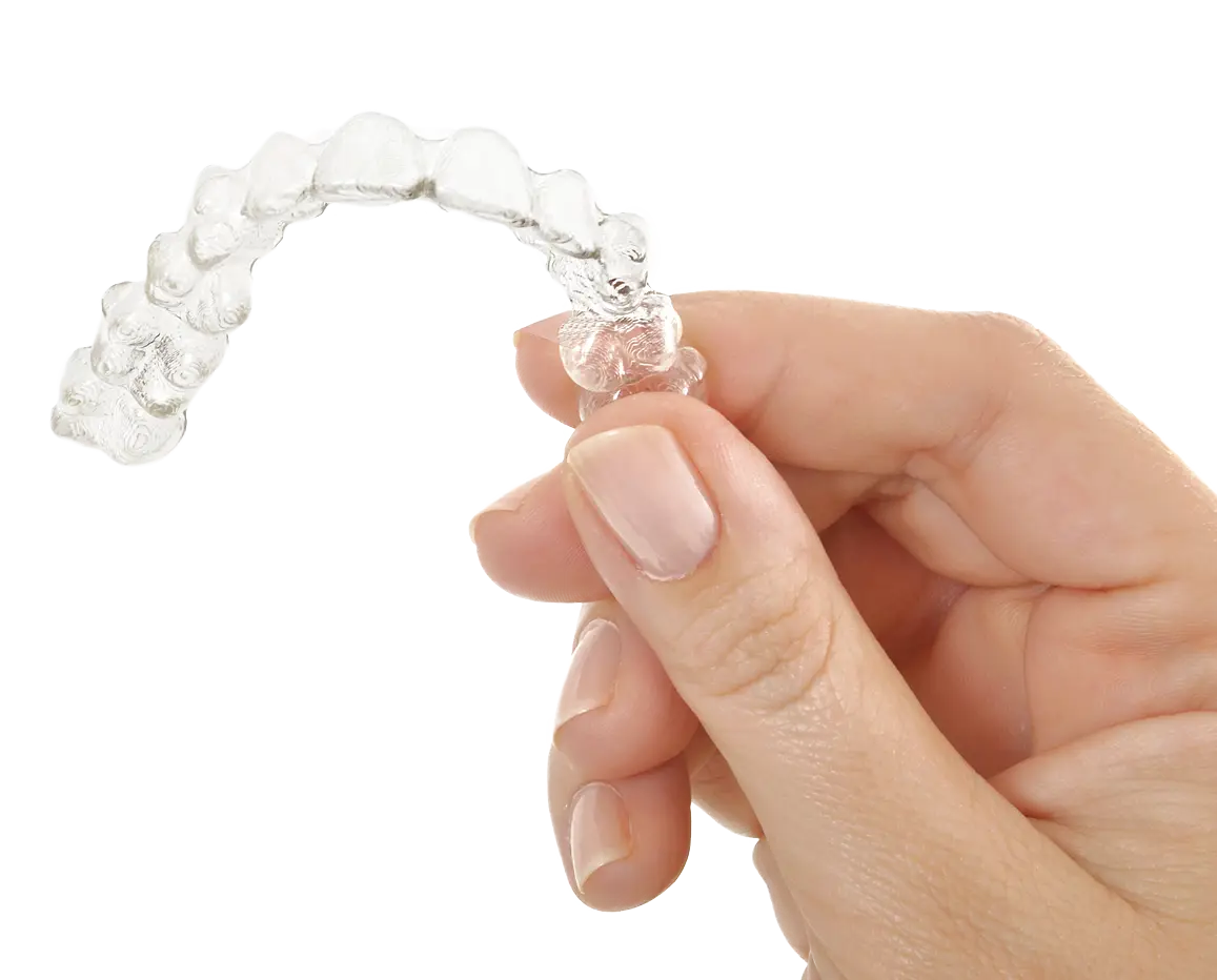 Clear Dental Aligner in Hand