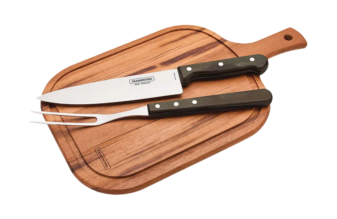 Knife and Fork on Wooden Chopping Board