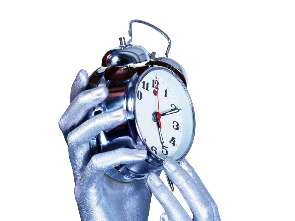 Silver Alarm Clock in Hands