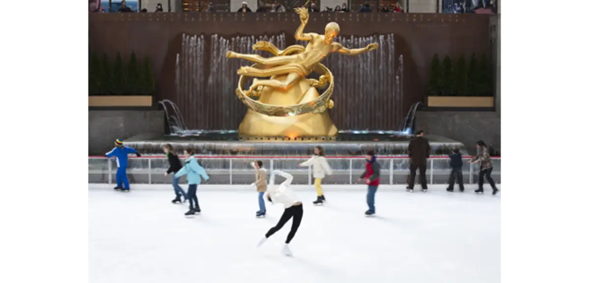 People Ice Skating at Rink