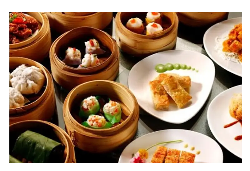 Assorted Dim Sum Dishes in Bamboo Steamers