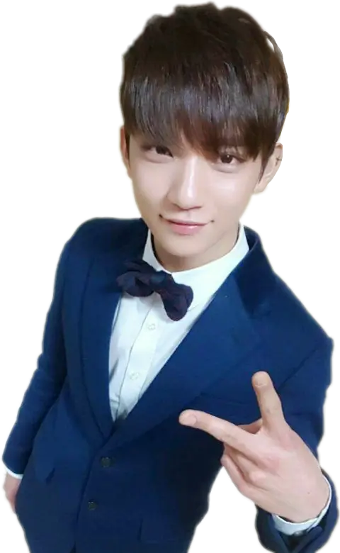 Young Man in Blue Suit Making Peace Sign
