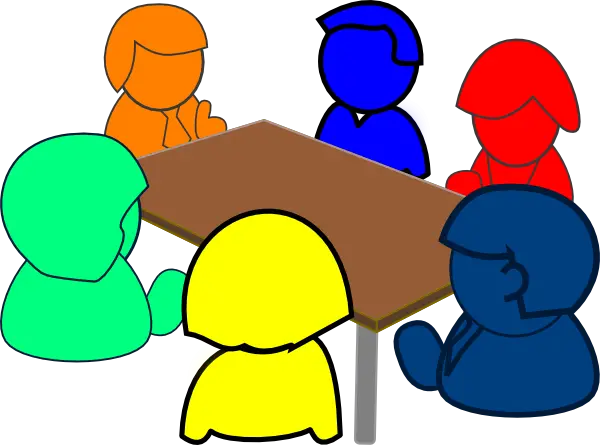 Colorful People Around a Table in Discussion