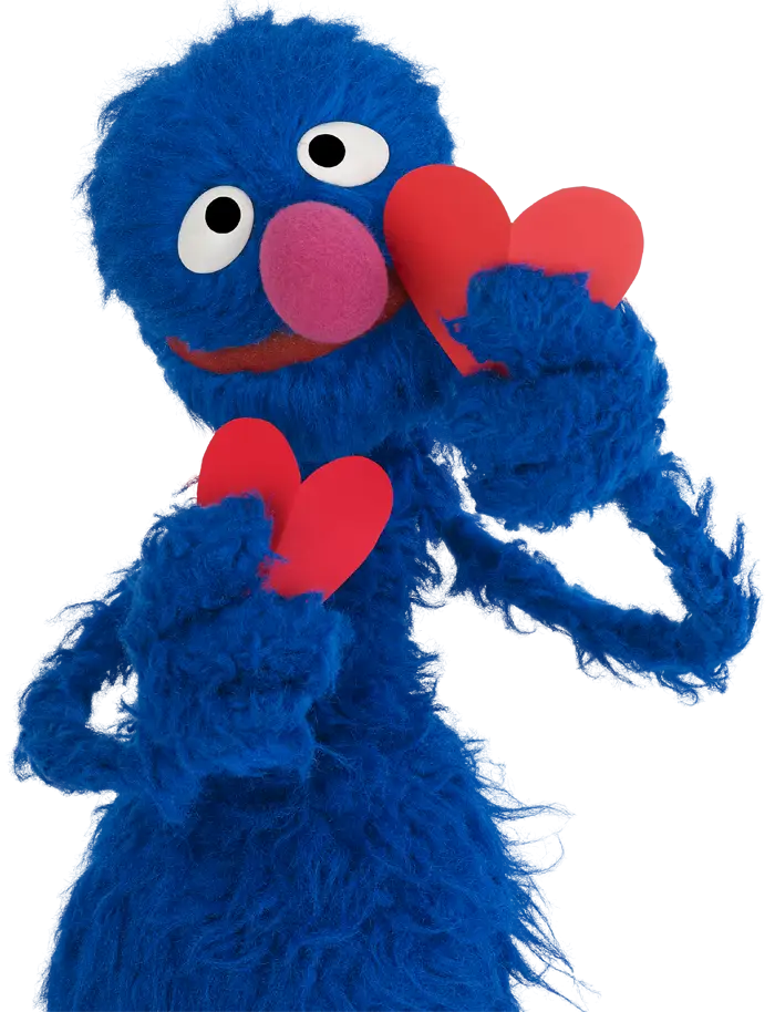 Blue Monster Holding Hearts